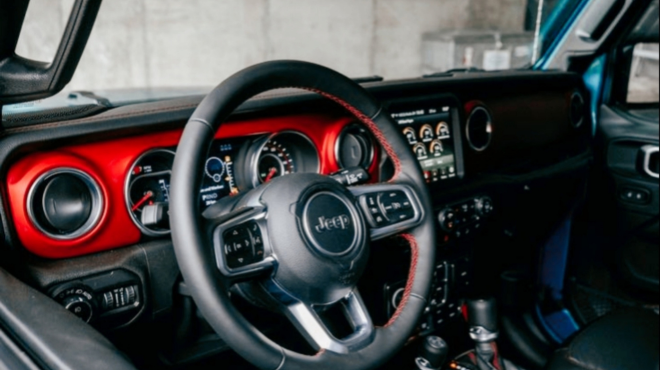 Jeep odometer dashboard that shows "Aux Switches Temporarily Unavailable Battery Charging" error