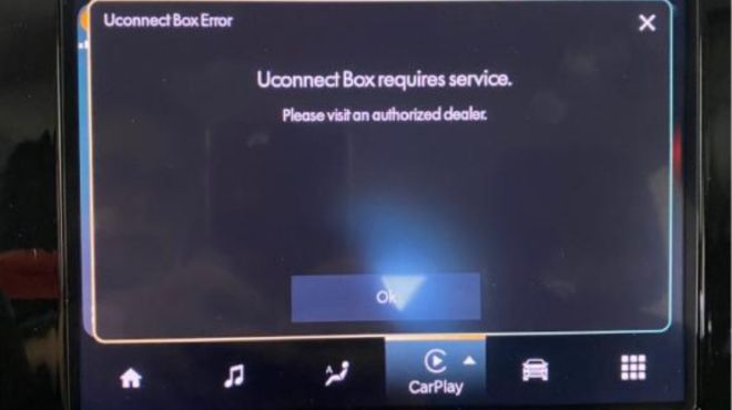 Uconnect Box Requires Service. Please visit an authorized dealer error message on Jeep dashboard
